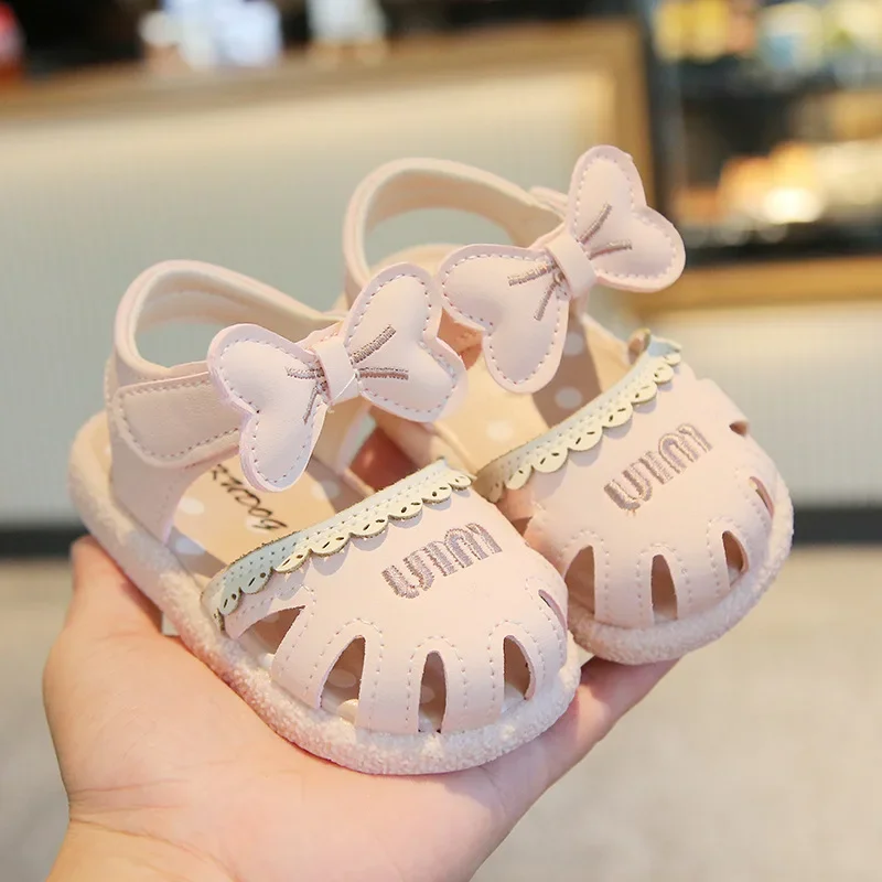 

2025 Children's Sandals Summer New Soft Bottom Baotou Anti-Collision Walking Shoes Female Baby Sweet Bow Non-slip Casual Shoes