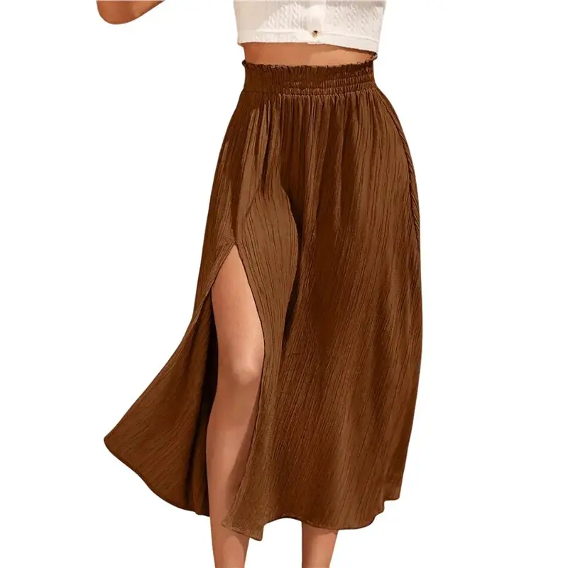 

Женская юбка миди с высокой талией, разрезом на бедре и плиссированной талией-папербэг.