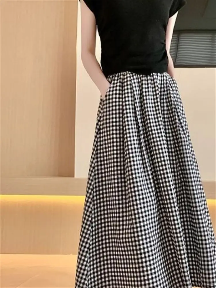 تنورة صيفية رفيعة منقوشة باللون الأسود للنساء عالية الخصر للتخسيس مقاس صغير غير رسمي على شكل حرف a تنورة طويلة نصف الجسم نمط ...