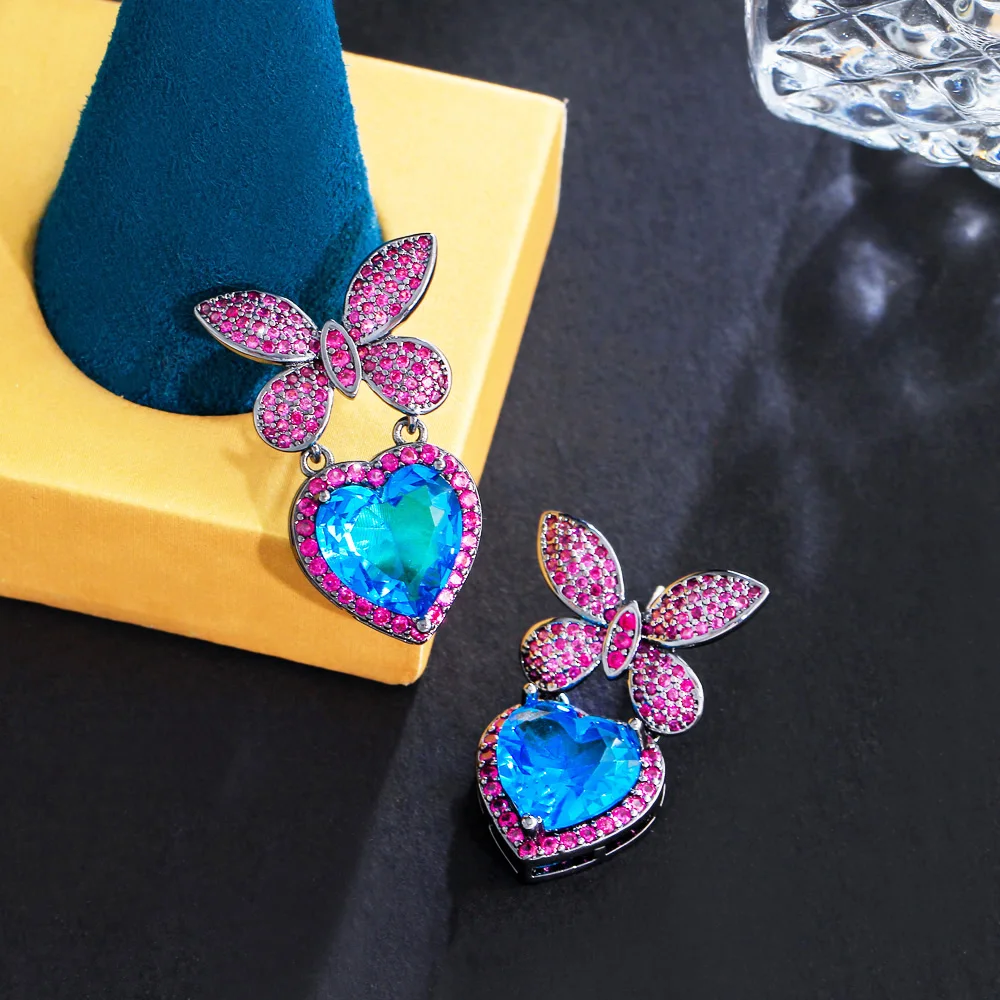 CWWZircons Beautiful Fuchsia Red Cubic Zircon Butterfly Chic Dangly Light Blue Heart Charm Drop Earrings for Women Party CZ546