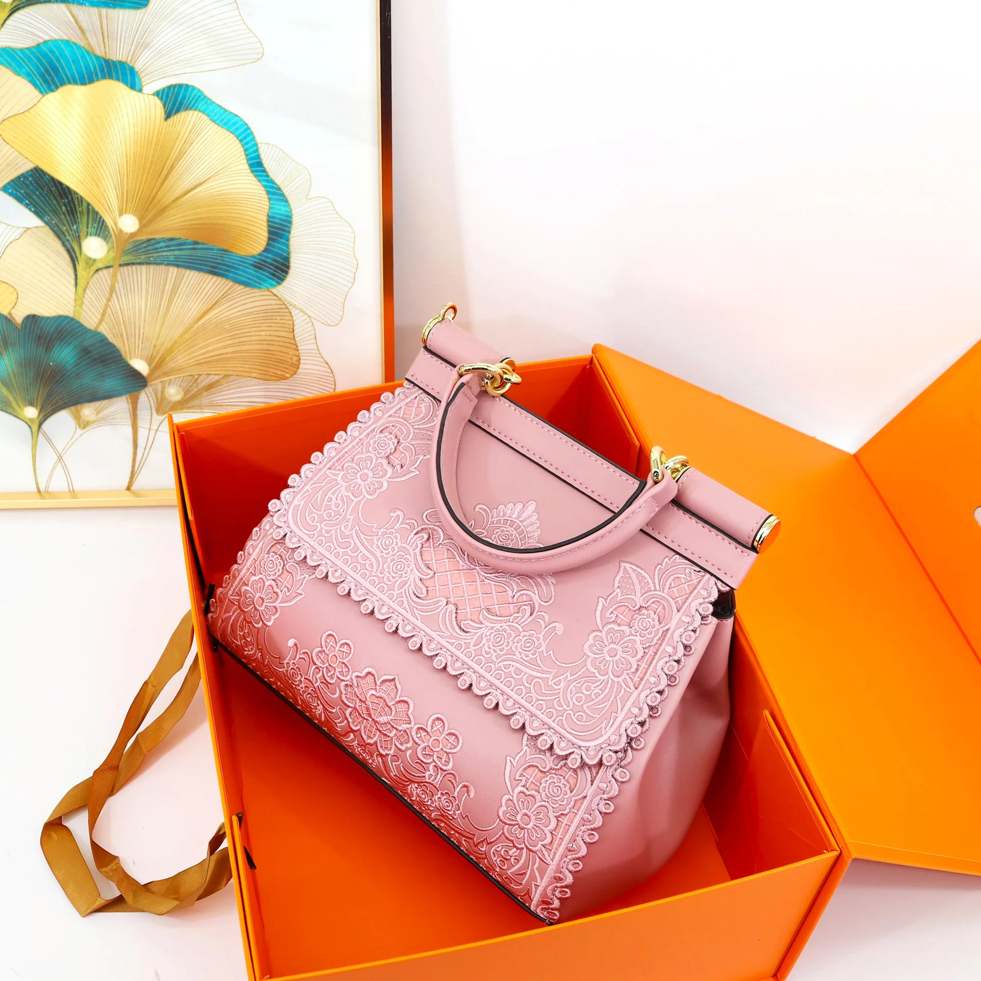 

Fashionable women's handbag with hollowed out embroidery and high-end feel