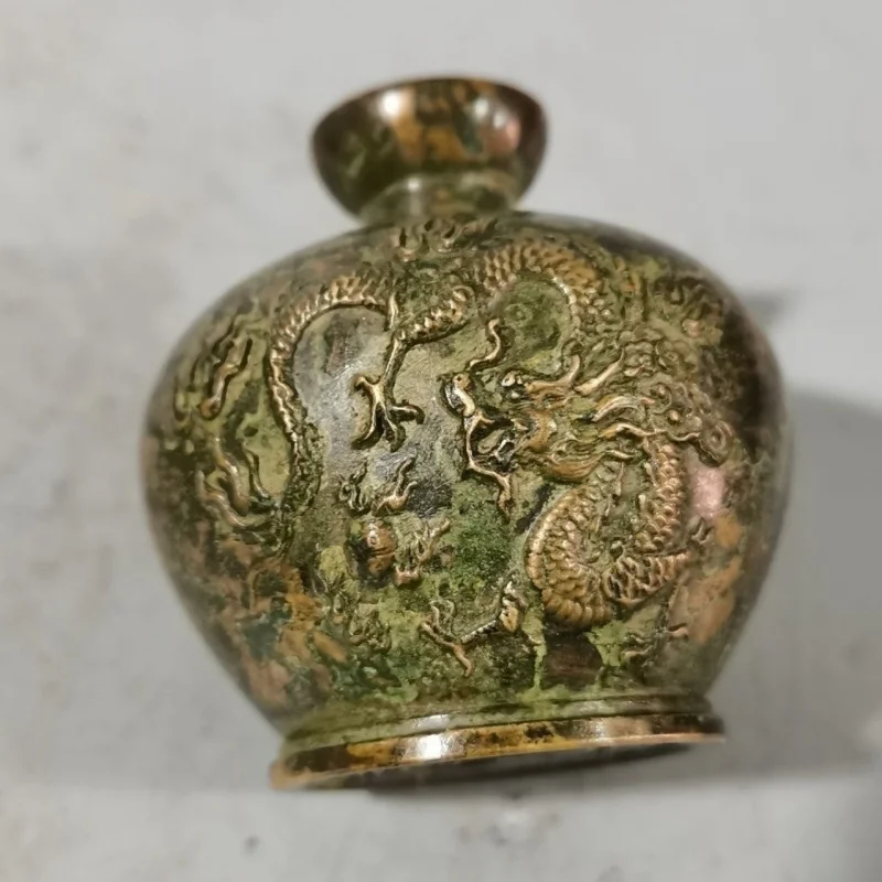 

Bronze Bagua Fire-Repelling Dragon Ornament with Gourd and Bottle, placed at Northwest Corner of Gate, where the Qian tr