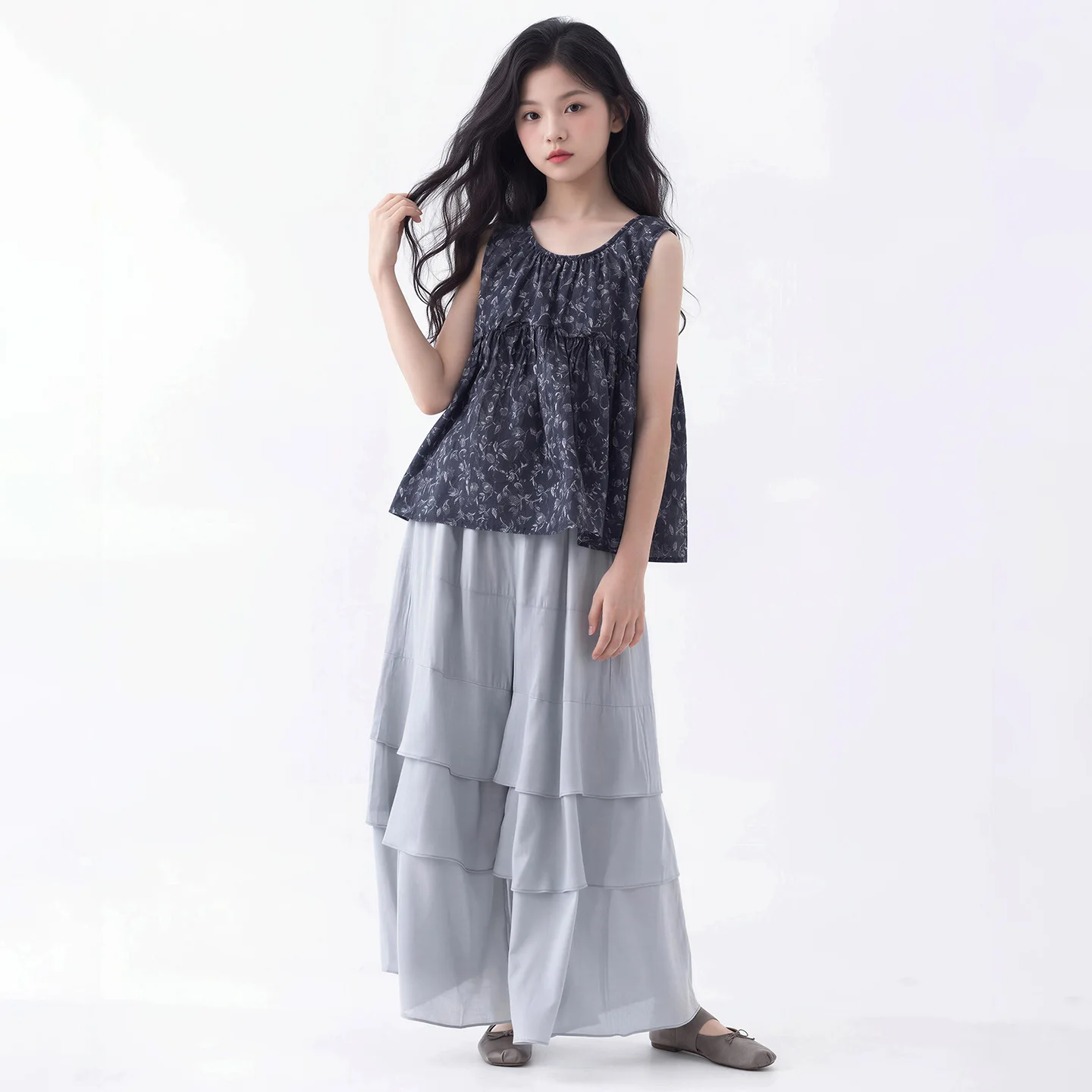 

Girls' 2026 summer new Korean version floral sleeveless doll shirt lightweight lotus leaf side length pants
