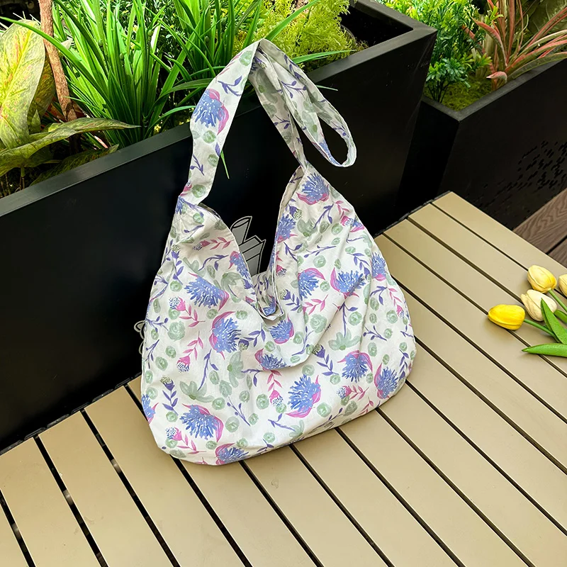 

Instagram Gentle Fragmented Flower Canvas Bag Women's One Shoulder Large Capacity Canvas Bag Commuter Handle Carrying Bag 2024
