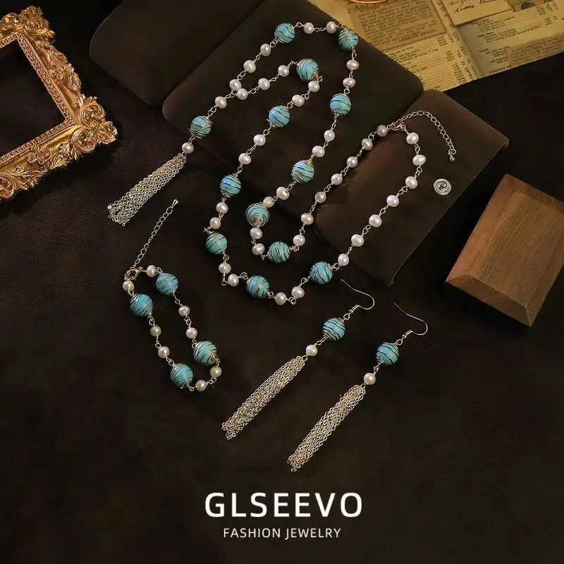 Design: A Set Of Three Pieces Including A Natural Pearl Wire-Wrapped Turquoise Necklace Bracelet And Earrings – Ver