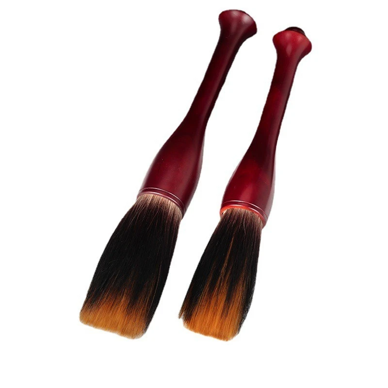 

The brush and large characters grab the pen, the pen list book inscription, and the brush to write the word blessing