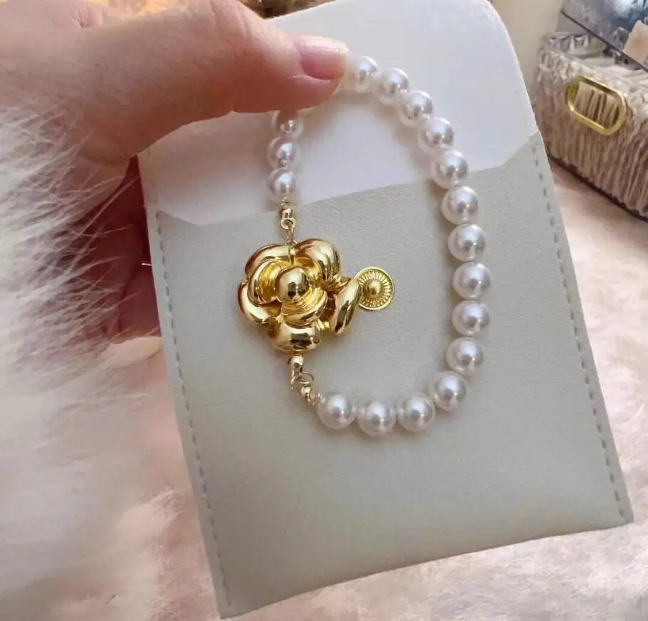 

Очаровательный браслет из круглого белого жемчуга Южных морей диаметром 9–10 мм, 7,5–8 дюймов, 925-е годы