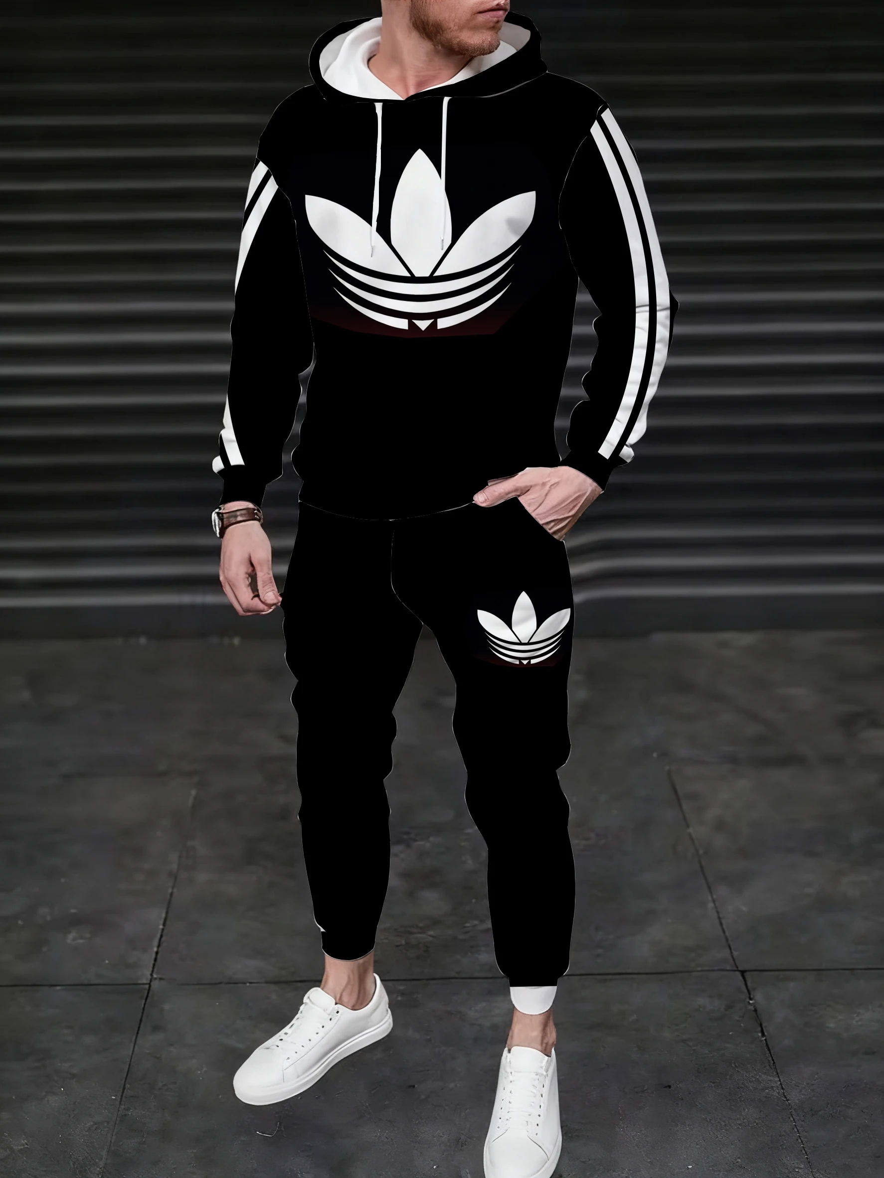 سويت شيرت رجالي بغطاء للرأس يقترن بنطال رياضي، مع خط هندسي بيضاوي متباين الألوان، ينبع نمط شارع متعدد الاستخدامات