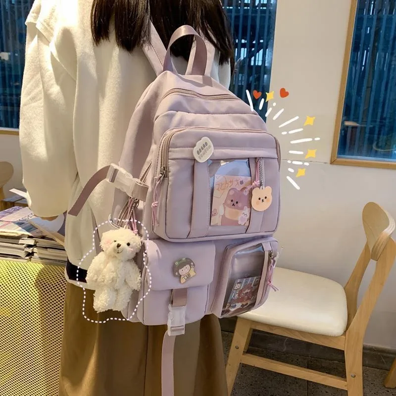 Mochila escolar de nailon con todo colgante para niña, bolso impermeable con bolsillo para estudiante, mochila Kawaii para mujer, paquete de libros para ordenador portátil