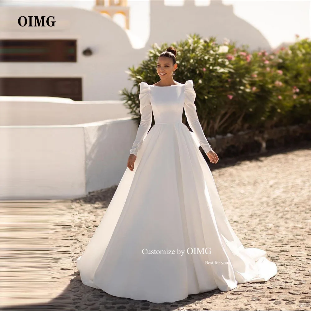 

OIMG Modest Satin Long Sleeves Wedding Dresses Boat Neck Long Sleeves Backless Bridal Gowns Sweep Train 2023 Vestido de noiva