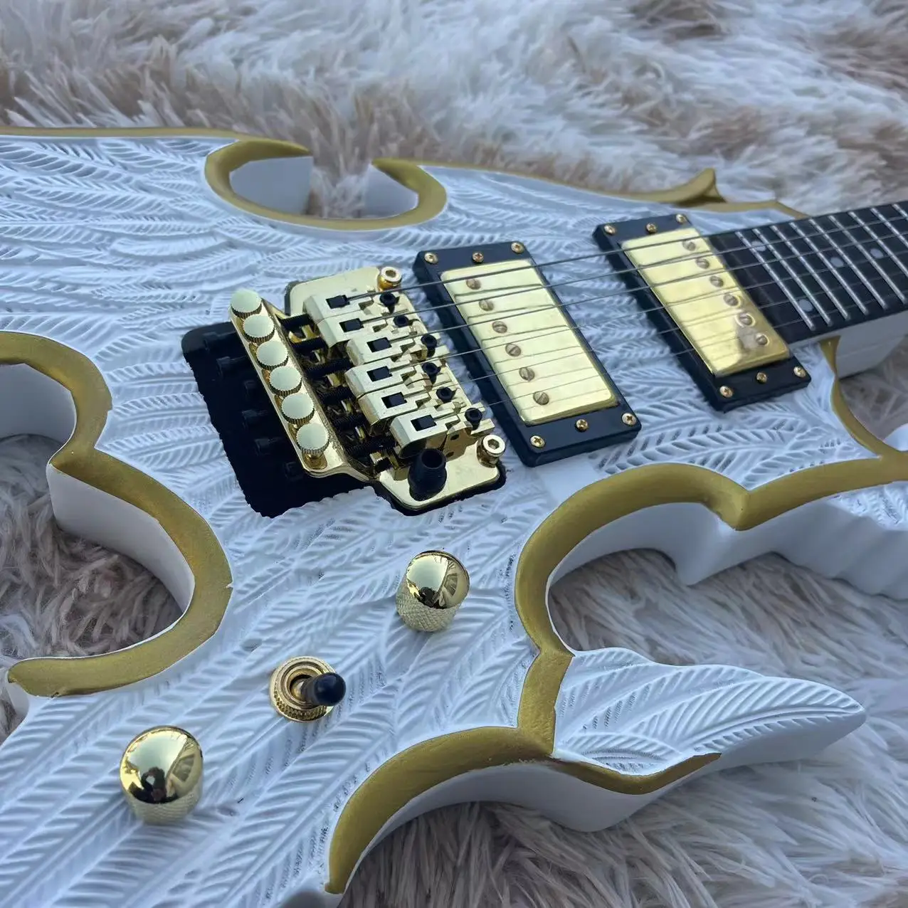 

Guitar 6-string carved Angel Wing electric guitar, matte white body, factory real picture, can be shipped upon order, free deliv