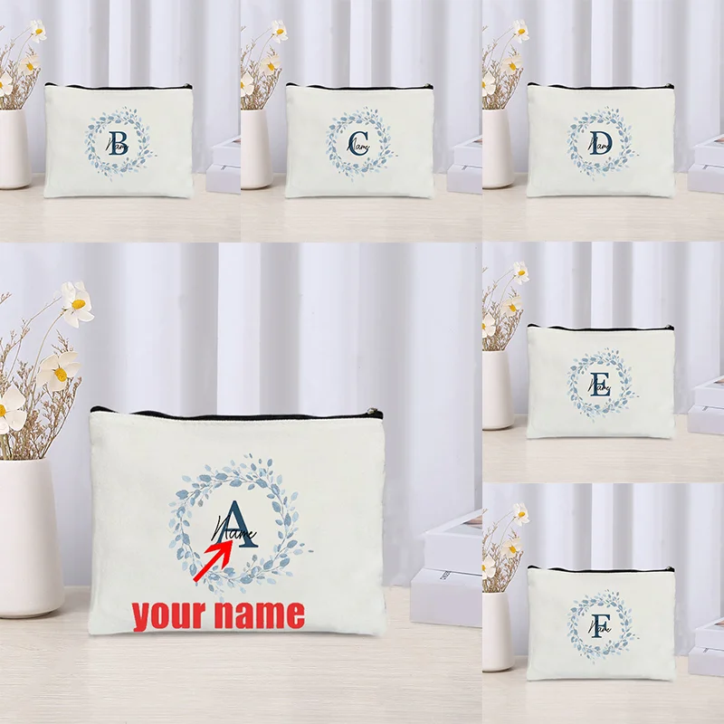 

Pretty Pastel Blue Leaves Custom Monogrammed Personalized Name Initial Canvas Makeup Cosmetic Toiletry Travel Bag Pouch Women