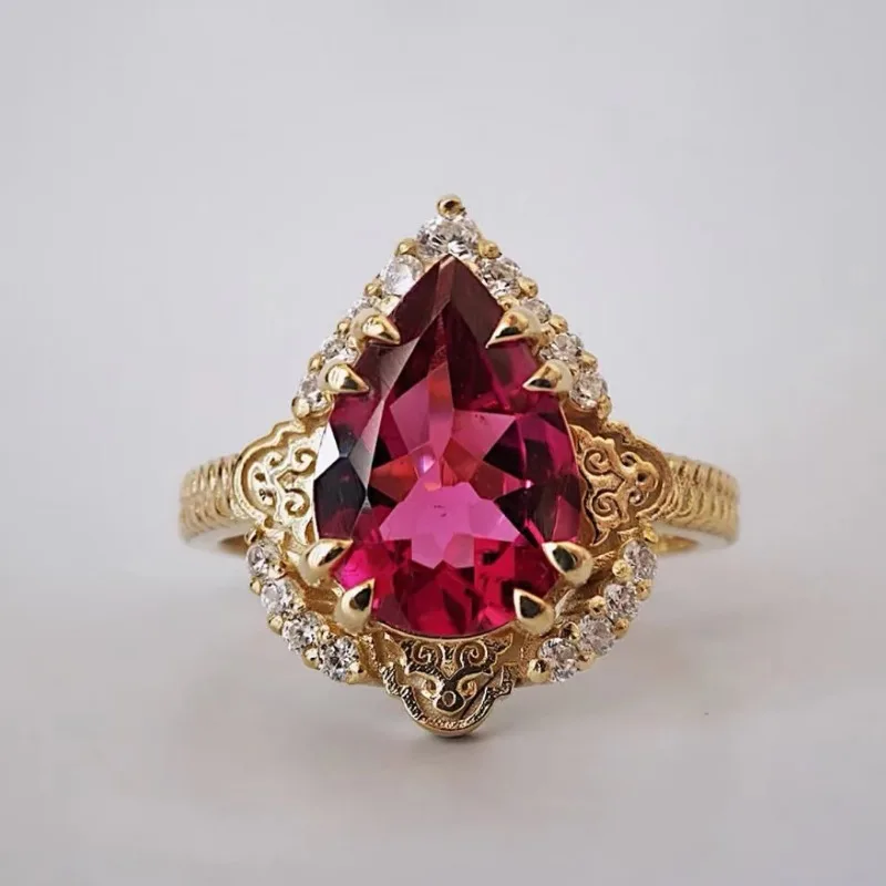 New European and American jewelry inlaid with water droplet red zircon retro palace gemstone women\'s ring