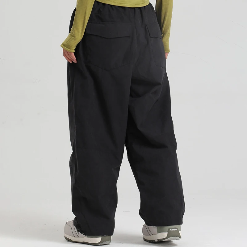 冬のマウンテンスポーツ男性スキーズボン屋外ハイキング女性スノーパンツ緩い防水女性スノーボード服着用