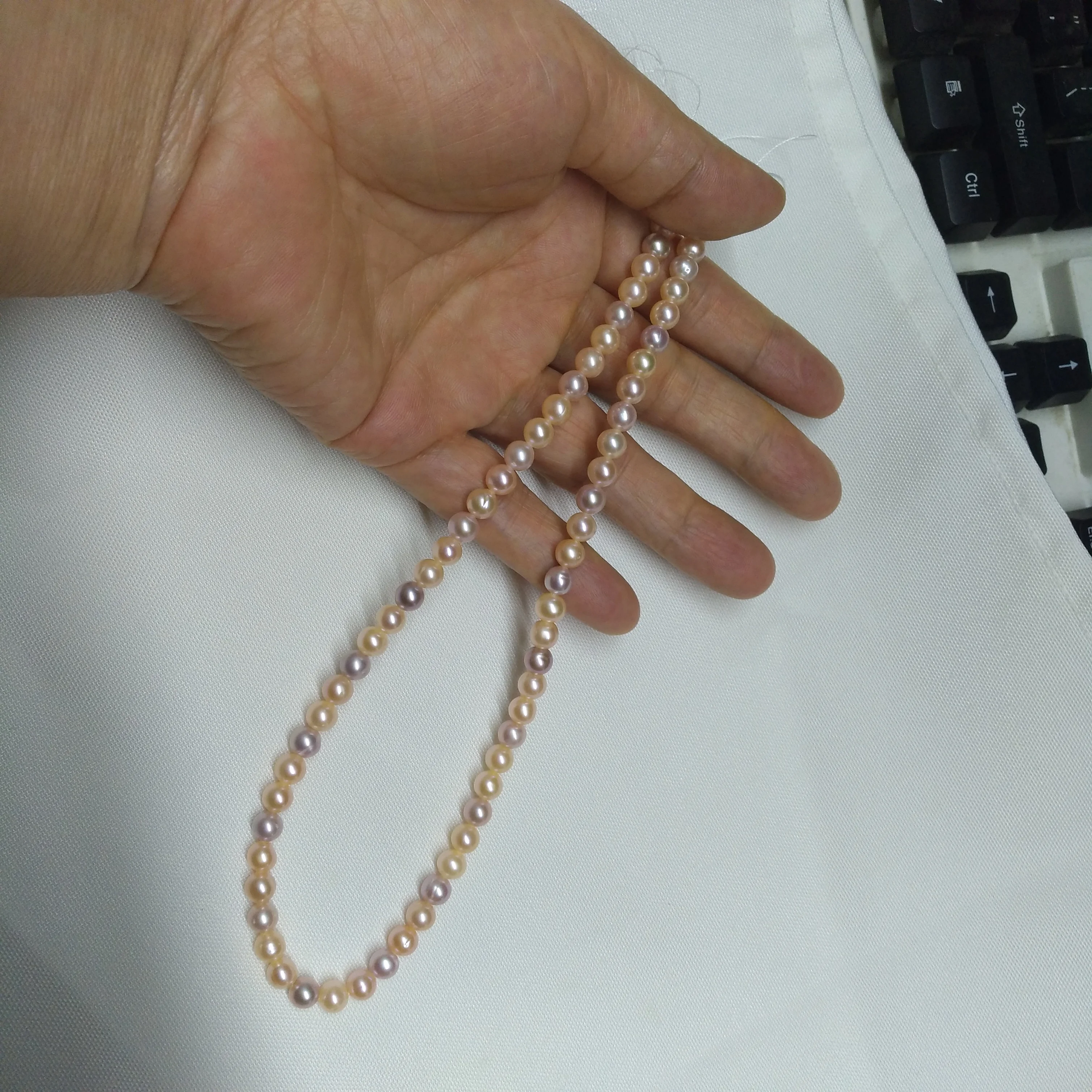 

Mixed Multi-Color Aaa++ Seawater Natural 6-7mm Pink Purple Round Pearl Necklace 18inch At Daily