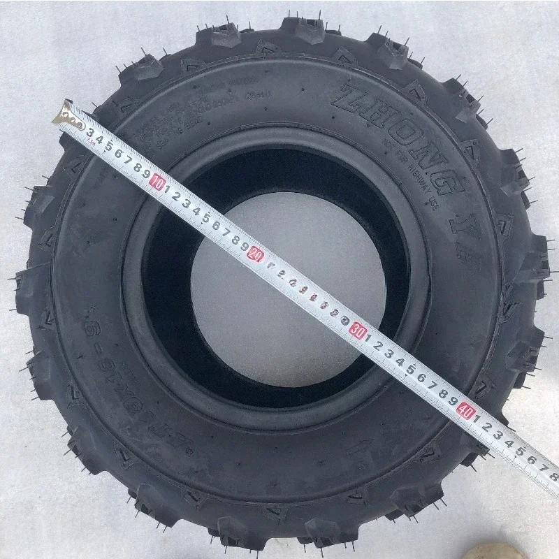 Four-wheeled motorcycle kart accessories, modified 19X10-9 inch vacuum square off-road tires in front of the Mighty