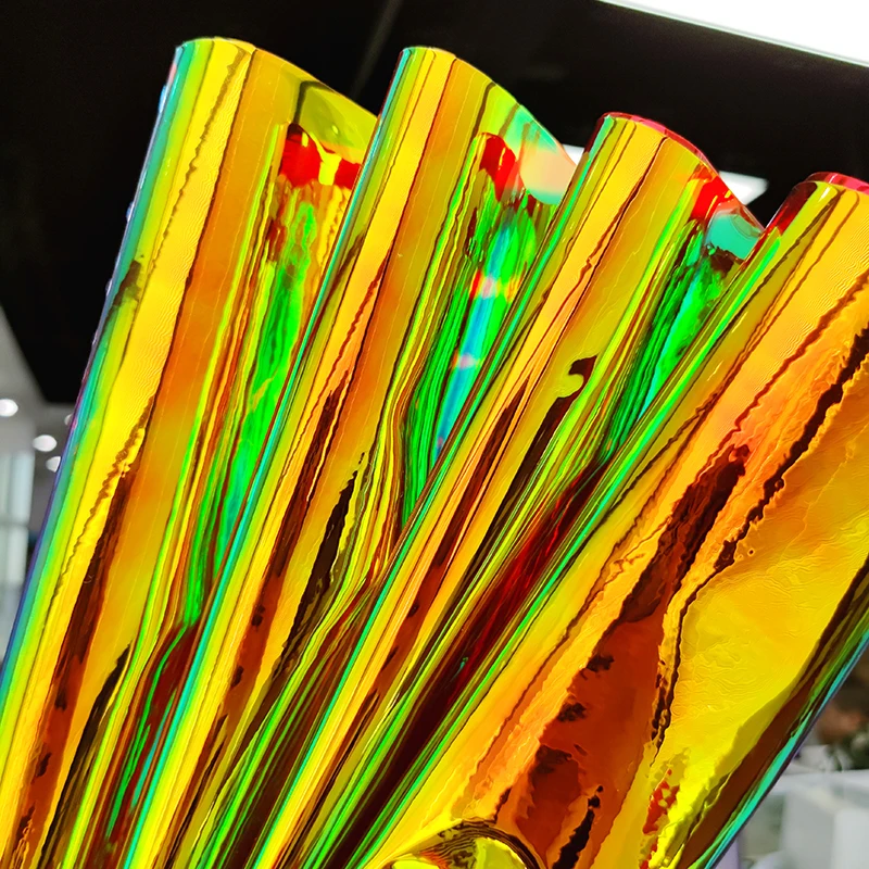 

Magic Bright Materials Colorful PVC Transparent Holographic Faux Leather Fabric For Upholstery Umbrellas Stationery Case Crafts