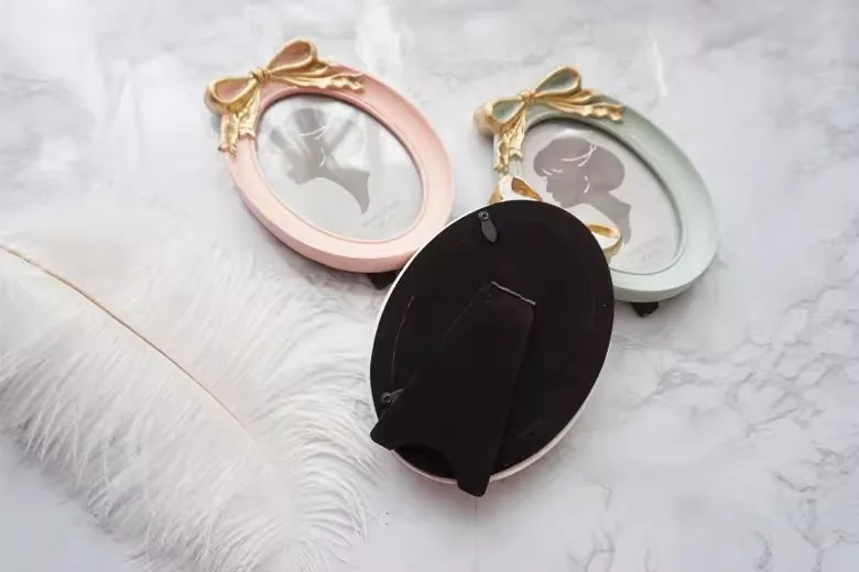 European Style Retro Relief Bow Resin Photo Frame, Sample Room Desktop 6-Inch Oval Photo Frame For Home Decoration