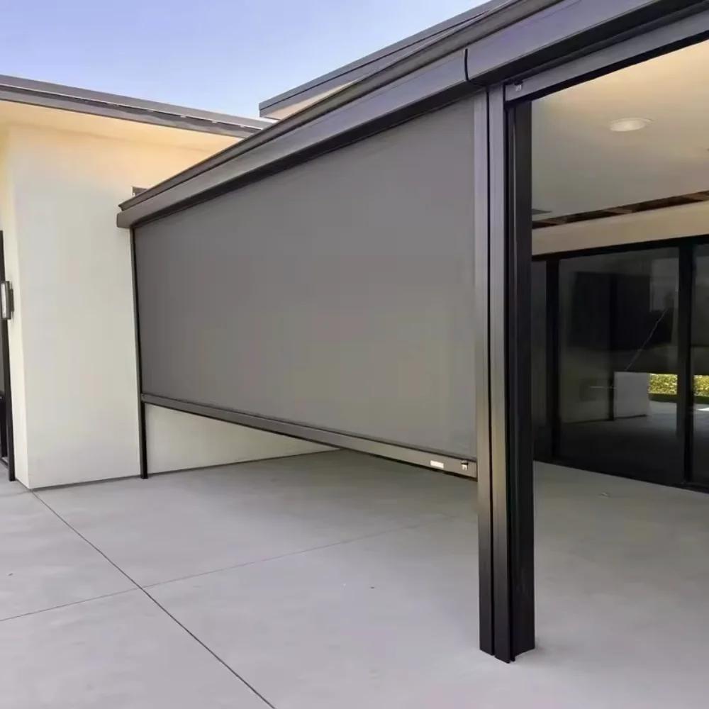 All-weather motorized outdoor blinds. Zip track system for windproof seal. PVC roller shade blocks sun & rain. Patio sun shading