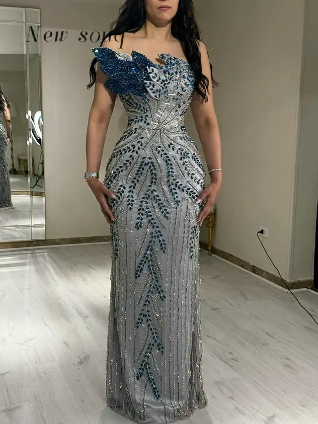 

Luxury Long Silver Mermaid Evening Dresses with Blue Crystals Customized Arabic Formal Party Gowns Elegant for Women Weddings