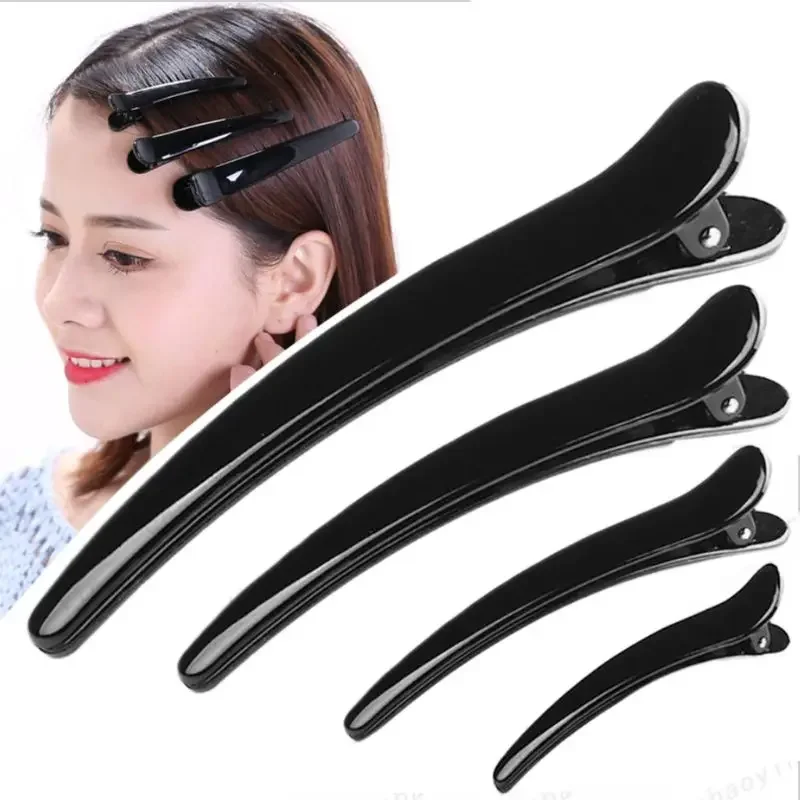 Black Plastic Single Prong Hair Clip for Professional Use
