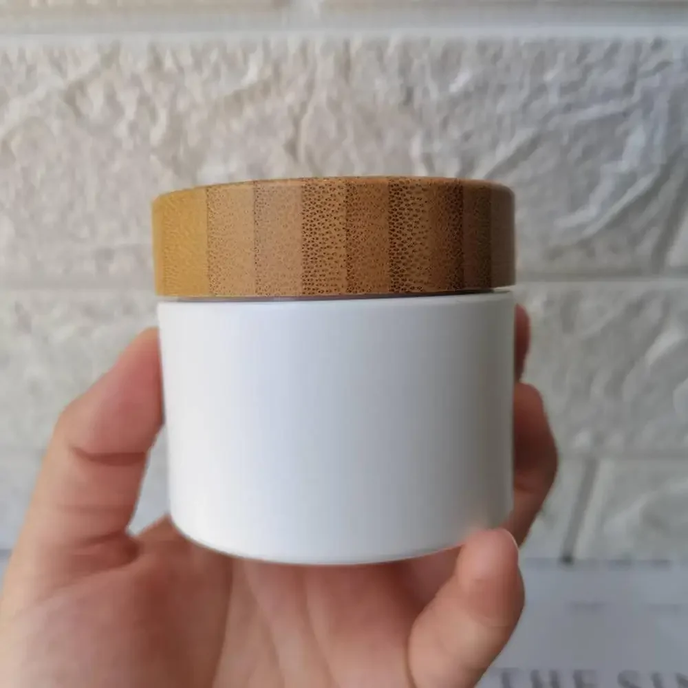 

Лидер продаж, высококачественные банки для крема для лица, бамбуковая крышка, деревянная крышка, белые пластиковые контейнеры, упаковка для косметического крема, бутылка с гравировкой