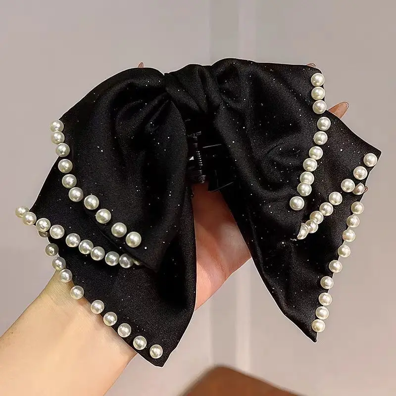 

New women's velvet solid color classic beautiful pearl fashion high-end simple autumn and winter hair accessory