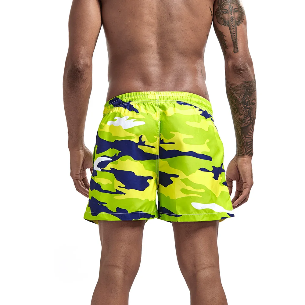 Pantaloni da surf da spiaggia da uomo Pantaloncini casual a tre punti Tendenza Comoda tasca laterale stampata Pantaloncini fitness sportivi Stile da uomo