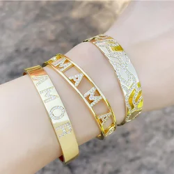FLOLA Gold Plated Amor MaMa Cuff Bangles Bracelets For Women White Stone Bangle Cubic Zirconia Luxury Jewelry Gifts brtc85