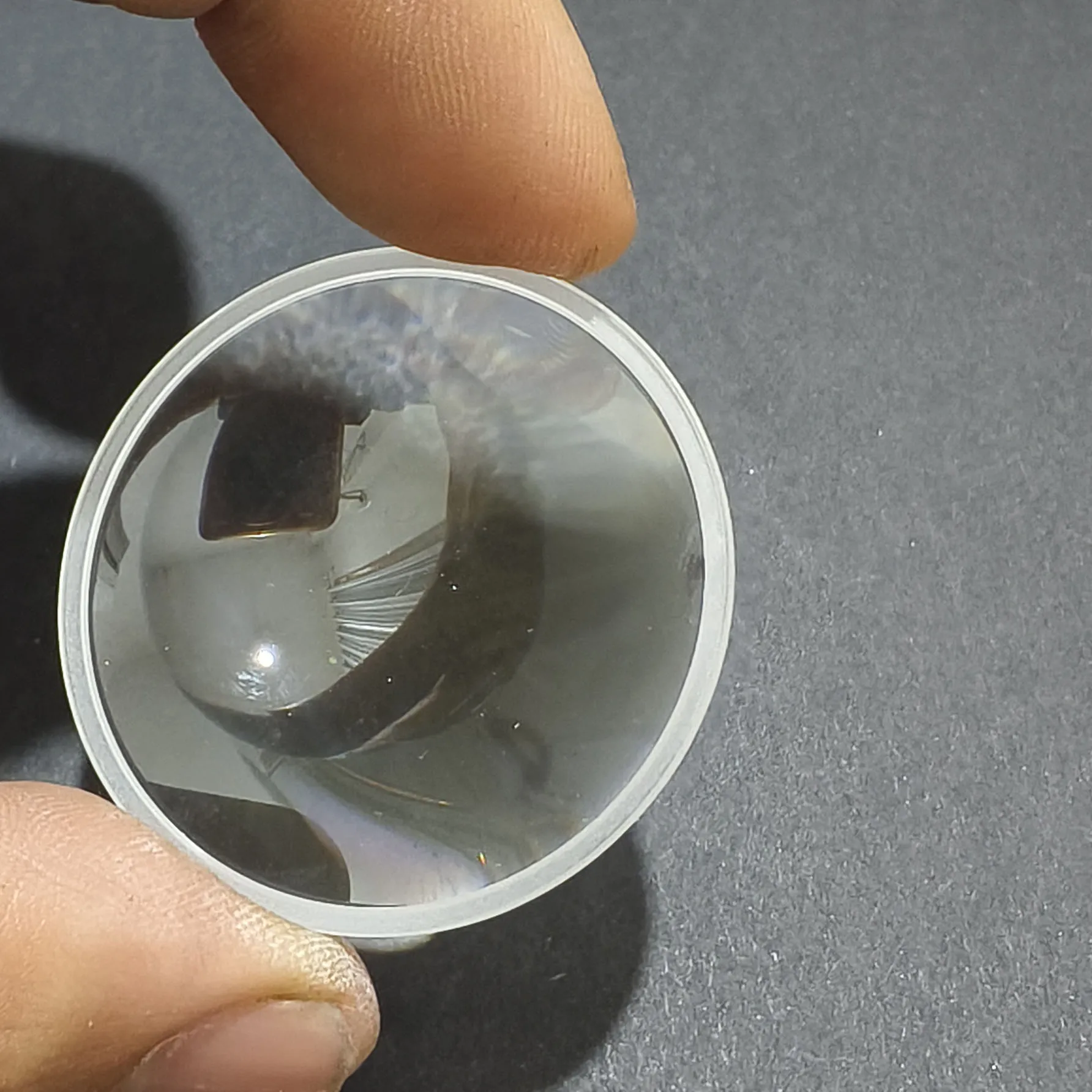 

Diameter of 23mm, focal length of 45mm, dual convex monolithic optical glass lens coated with 400 to 700nm part number R108