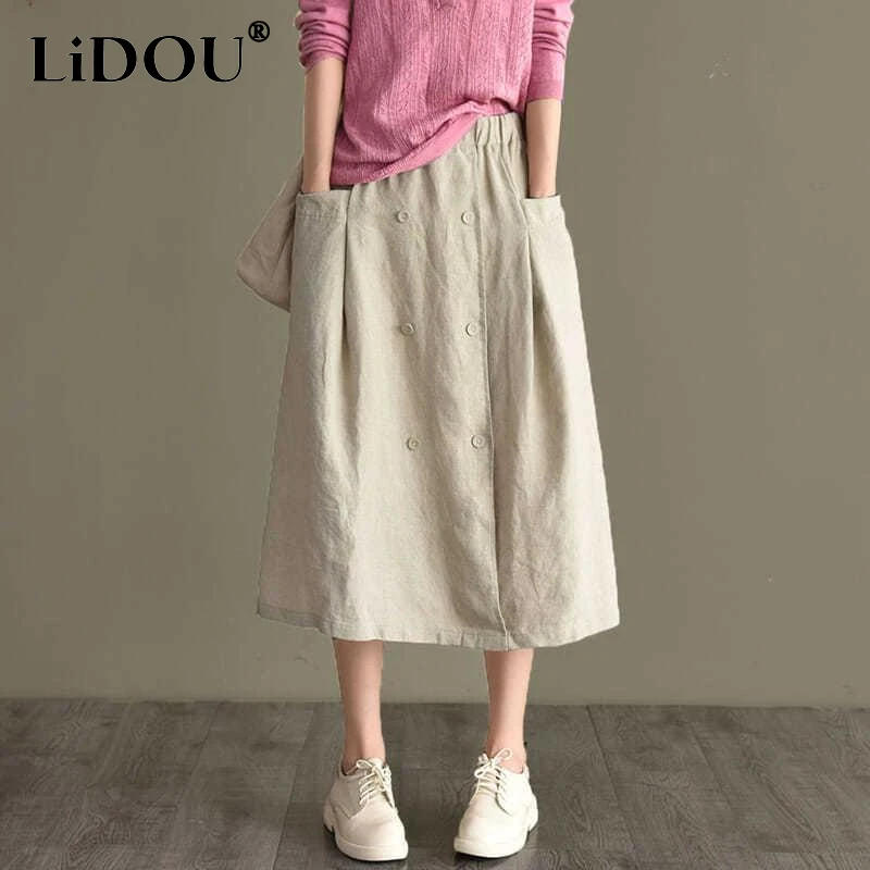 

Spring Summer New Solid Color Elastic Waist Pockets Double Breasted A-line Skirt Women Vintage Loose Casual Female Clothing