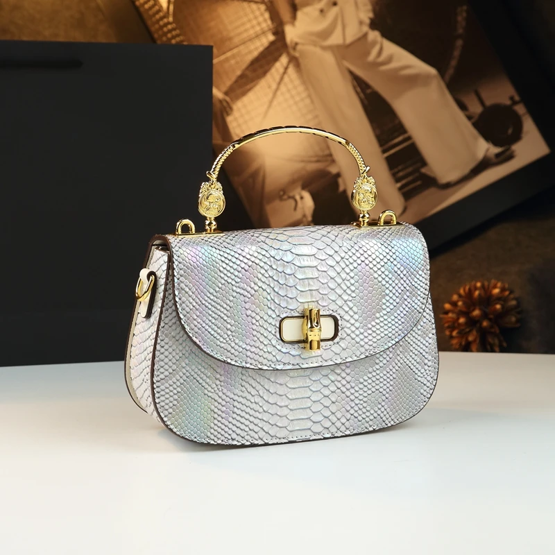 

Serpentine Leather Women Handbags 2025 Fashion Metal handle Wide Shoulder Strap Saddle Bag Design Small Shoulder Messenger Bags