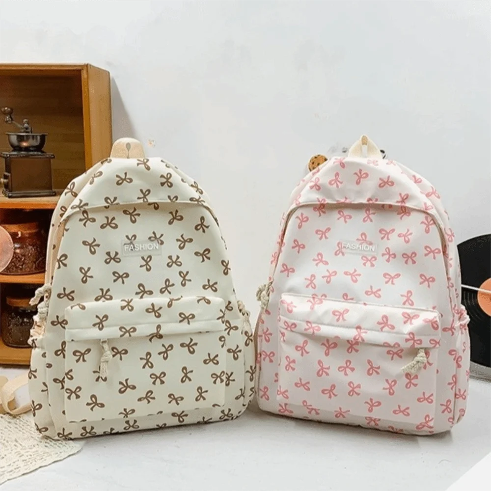 حقيبة ظهر من النايلون خفيفة الوزن ذات سعة كبيرة للطلاب حقيبة مدرسية حقيبة تخزين بحزام قابل للتعديل حقيبة كتف للمراهقين