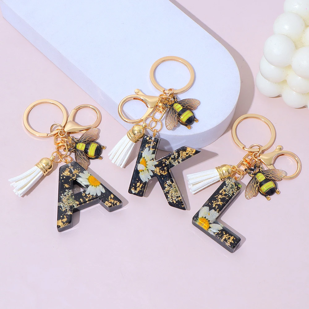 黒色樹脂レターキーホルダー金箔ひまわりイニシャルキーリング蜂 - Resin Art Alphabet のレビューと価格