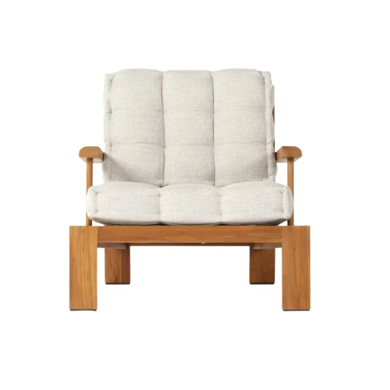

Outdoor lounge chair with teak frame and soft cushions