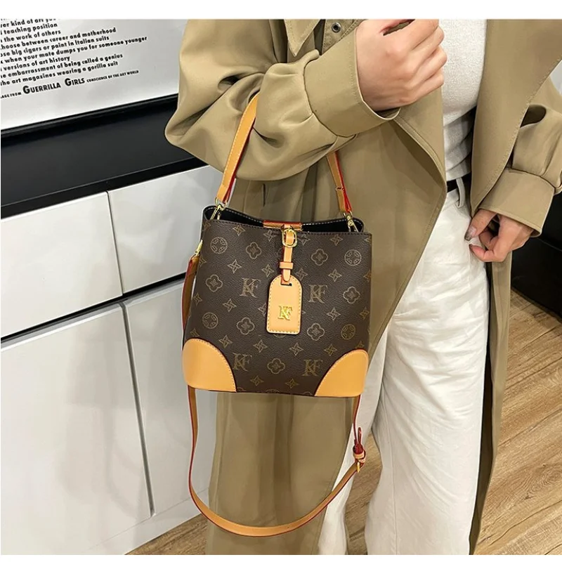 Toplaagse dameshandtassen, gemaakt van echthoekig bedrukt leer, trendy Wales, duurzame, lichtgewicht, zachte stijl