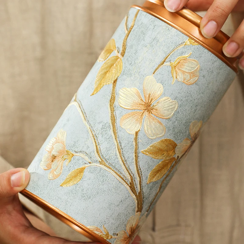 Exquisitas impresiones de flores, lata redonda para té, almacenamiento de aperitivos, caja de almacenamiento sellada para cocina, caja de té de estilo chino conveniente