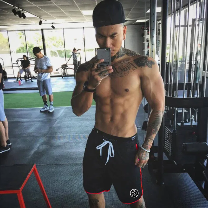 Muscleguys pantalones cortos de gimnasio para hombre, ropa de culturismo, malla deportiva, baloncesto, entrenamiento, Joggers con bolsillo