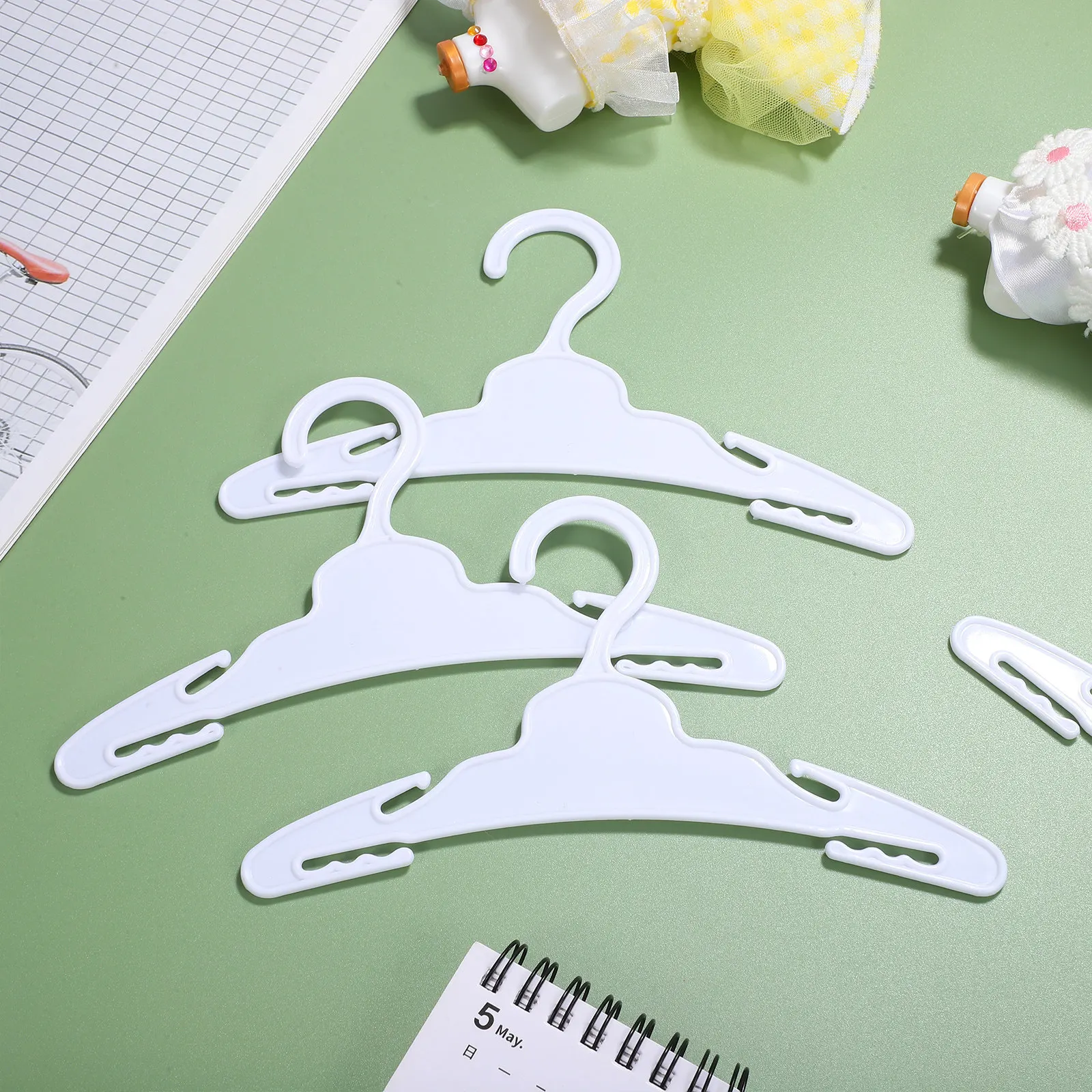 

12Pcs Mini Clothes Hangers for Premium Plastic Sturdy Hangers Realistic Function Safe Round Edges No Small Parts Included