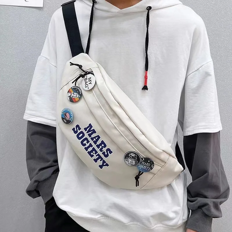 2023 New Street แนวโน้มเอว Unisex Causal กระเป๋าคาดหน้าอกผ้าใบความจุขนาดใหญ่ Crossbody กระเป๋ากลางแจ้ง Messenger กระเป๋า