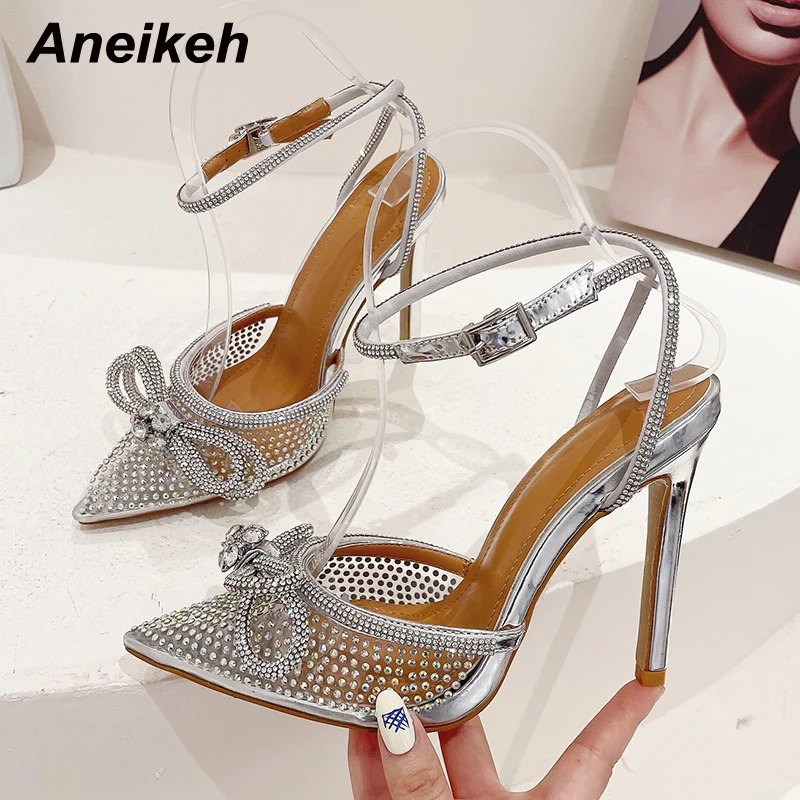 Aneikeh 2026 Fashion Silver Butterfly-Knot Narrow Band Bling Cross-Tied Crystal Pointed Toe Pumps Sandals Heels Women Shoes