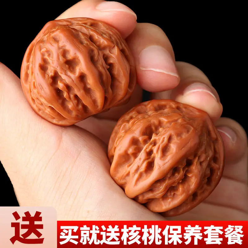 Hand-carved walnut with rough texture round lantern shape small autumn-themed figurine rice-patterned base eight-sided knott