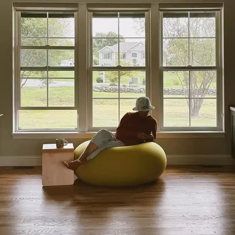 Donuts, floor-to-ceiling ornaments next to the sofa in the living room, soft home decorations