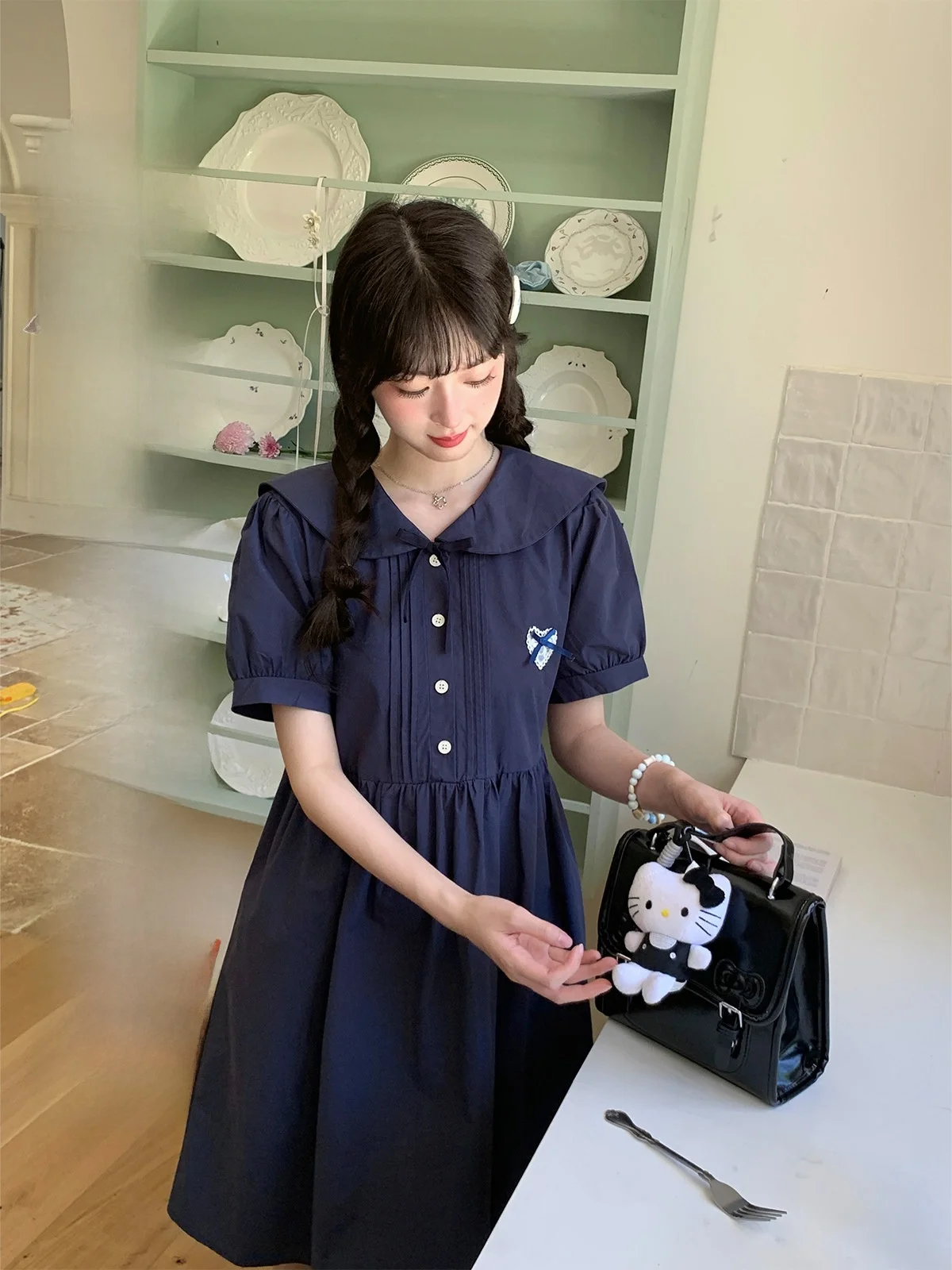 

Летняя женская юбка-трапеция Bibi Bency 78 Navy с завышенной талией, эффектом похудения и пышными рукавами, в стиле Sweet Sle