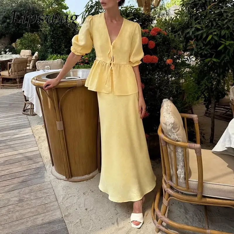 

Elegant V-neck Lace Up Top & Long Skirt Suit Women Casual Puff Sleeve Holiday Outfit 2025 Fashion High Waist Solid 2 Piece Sets
