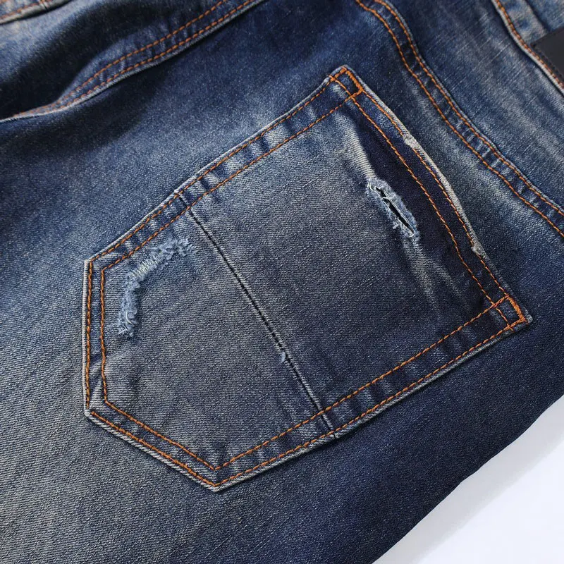 

Y2K High Street Fashion New Men's Jeans Washed Nostalgic Perforated Black Leather Patch Blue Jeans Hip Hop Brand Splicing Pants