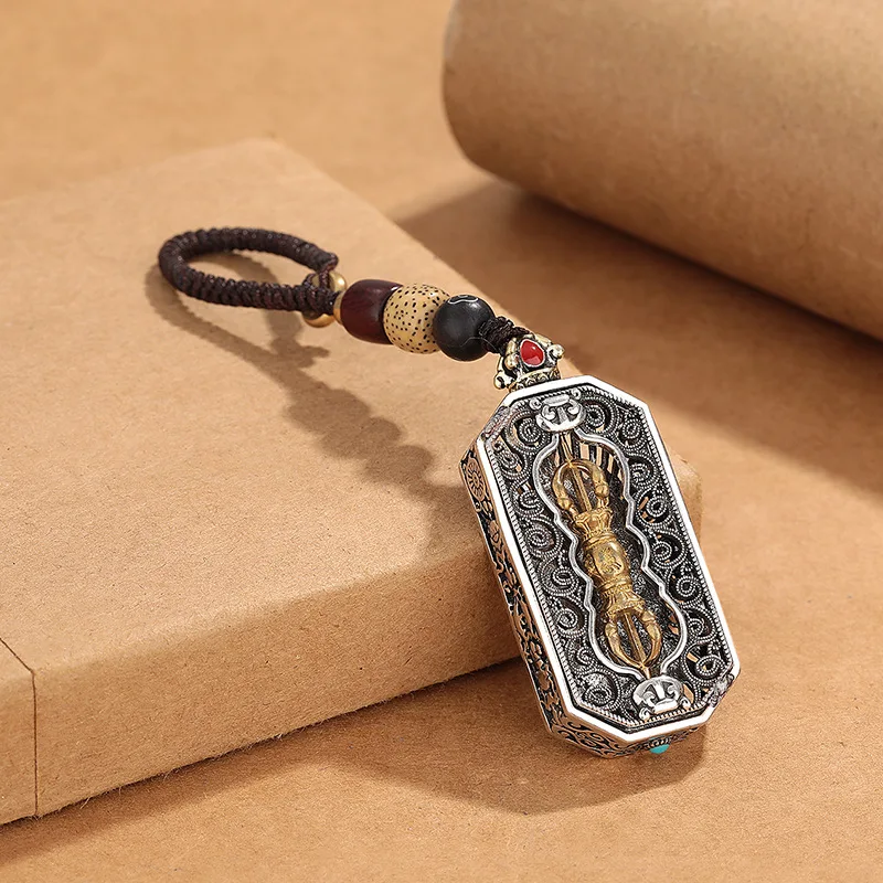 

Retro ethnic style men's Vajra keychain, rotatable hollow design, religious retro style, lucky pendant jewelry gift.