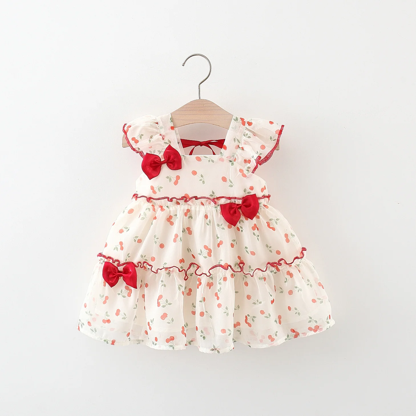 

Летнее новое милое и милое платье с бантом для малышей 0-4 лет, корейская версия, хлопковое платье с цветочным принтом, вишневое шифоновое сетчатое марлевое идиллическое юбка