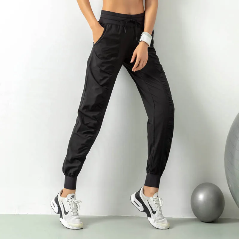 Calças de corrida com cordão feminino, secagem rápida, cintos respiráveis de fitness, bolsos laterais, adequados para correr, fitness