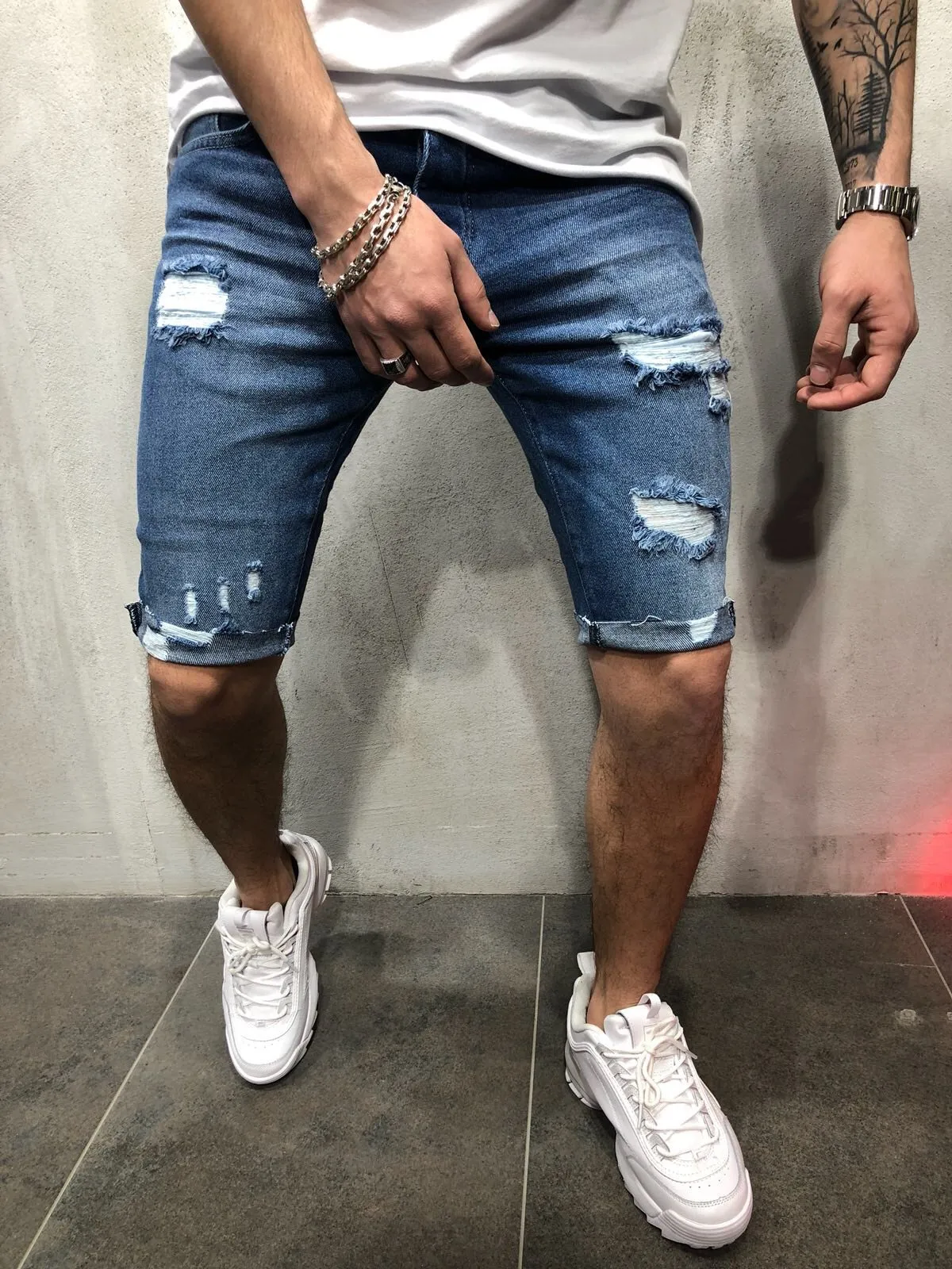 

European and American denim capris with holes slim fit and slimming men's pants European station men's ripped shorts jeans